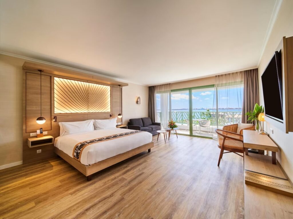 Modern oceanview rooms and pool area at Hilton Tahiti resort with tropical coastal views