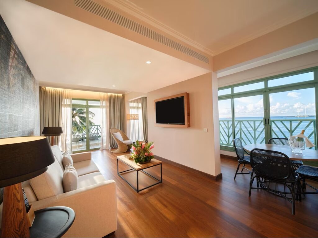 Modern oceanview rooms and pool area at Hilton Tahiti resort with tropical coastal views