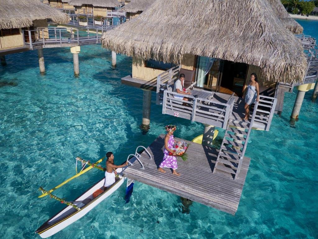 InterContinental Bora Bora Le Moana Resort bungalow interior, overwater deck experience, and lagoon bungalows aerial view