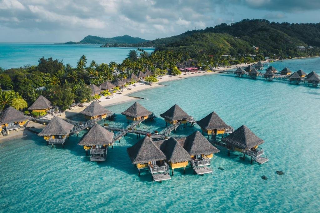 InterContinental Bora Bora Le Moana Resort bungalow interior, overwater deck experience, and lagoon bungalows aerial view