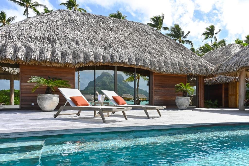 Le Bora Bora by Pearl Resorts overwater bungalows, villa interior, and private pool with tropical mountain views