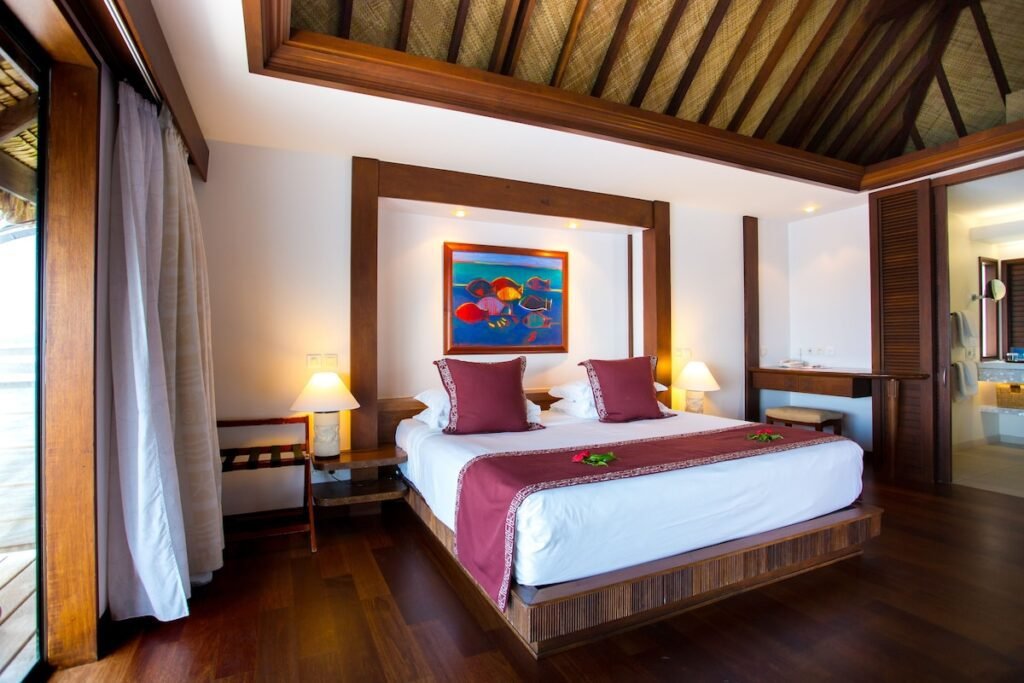 Manava Beach Resort Moorea overwater bungalows, beachfront lagoon, and tropical guest room interior