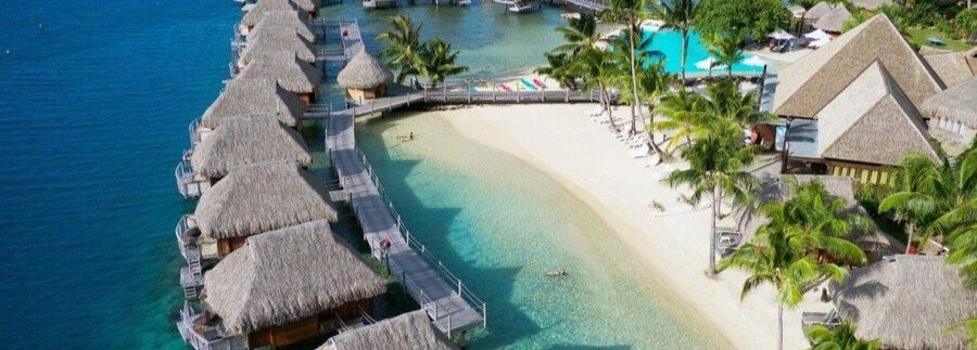 Manava Beach Resort Moorea with overwater bungalows, sandy beach, and turquoise lagoon