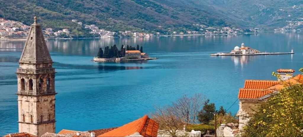 Scenic view of the Beautiful Adriatic Coast with historic towns, blue waters, and green hills.