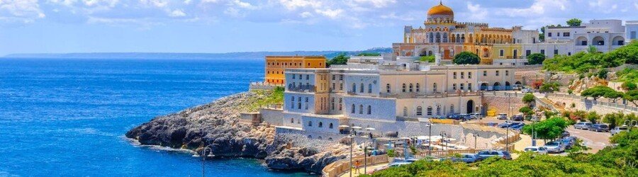 Coastal town along the Salento Adriatic Coast in southern Italy with cliffs and blue sea