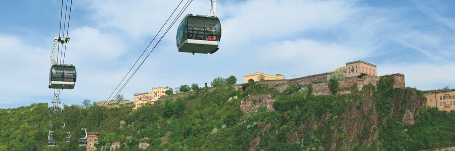 Ehrenbreitstein Fortress and cable cars overlooking the Rhine River.