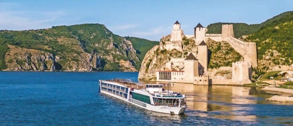 Rhine River cruise ship sailing past medieval castle near Zurich Switzerland