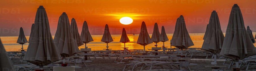 Sunset over Rimini Beach also reflecting on the Adriatic Sea