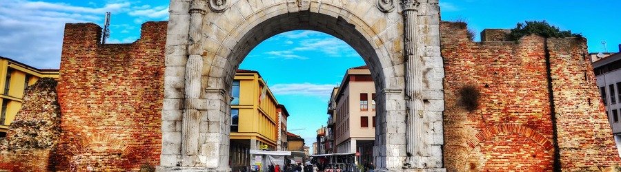 Arch of Augustus in Rimini with historic stone arch and city street