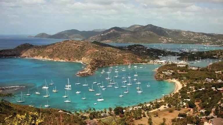 Antigua and Barbuda beaches with turquoise Caribbean water, sailboats, and tropical coastline