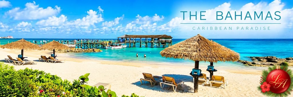 Beautiful Bahamas beach with white sand, turquoise Caribbean water, thatched umbrellas, lounge chairs, and a wooden pier extending into the sea.