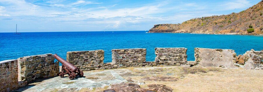 Fort James Antigua and Barbuda coastal view with historic cannon and Caribbean sea