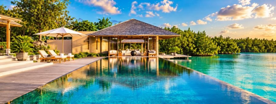 Luxury infinity pool and tropical lagoon at Amanyara in Turks and Caicos, one of the Best Beach Resorts.