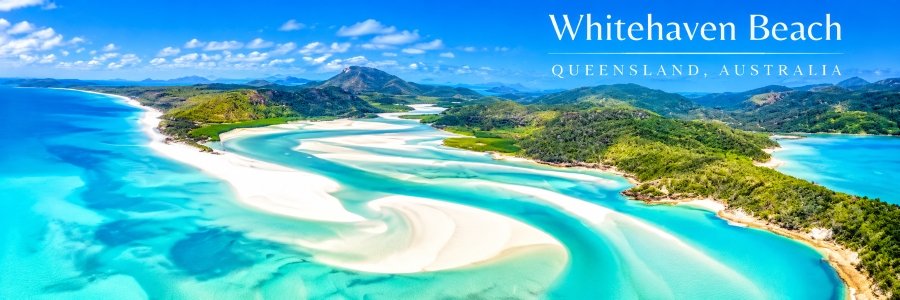 Aerial view of Whitehaven Beach in Queensland, Australia, showing swirling white sandbars, turquoise tidal channels, and lush green islands.