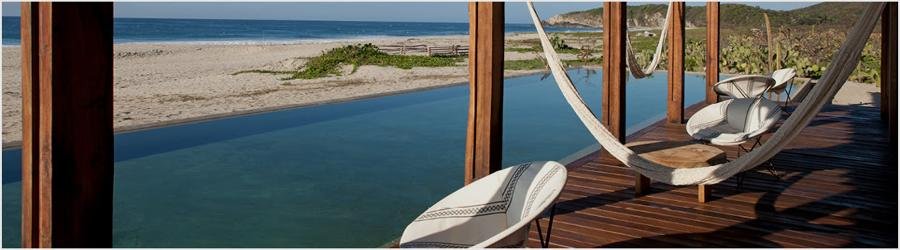 Peaceful beachfront retreat with hammocks overlooking Oaxaca’s Pacific coast.