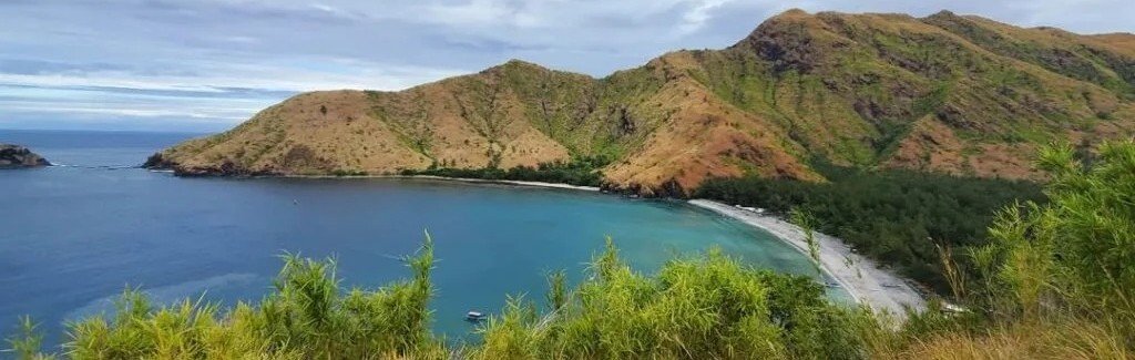 anawangin cove volcanic beach and mountains in zambales luzon philippines