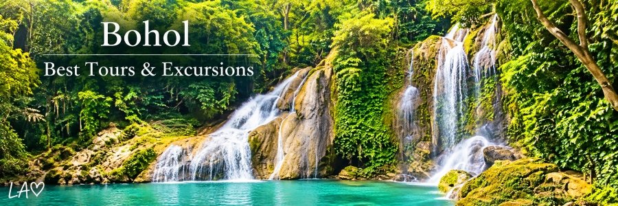 Bohol Best Tours & Excursions banner featuring cascading tropical waterfalls, lush green jungle, moss-covered rocks, and a beautiful turquoise natural pool.