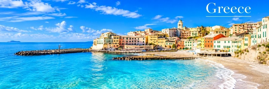 Colorful Greek seaside village overlooking turquoise Mediterranean waters and a sandy beach, showcasing some of the most beautiful beaches in the world.