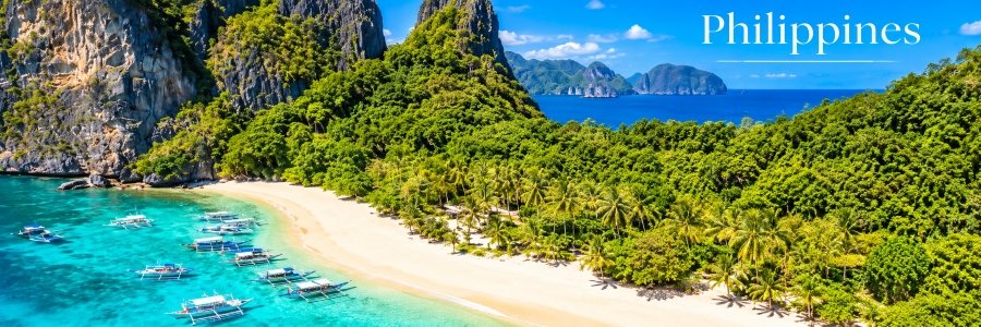 Tropical beach in the Philippines with turquoise water, limestone cliffs, and outrigger boats, showcasing some of the most beautiful beaches in the world.