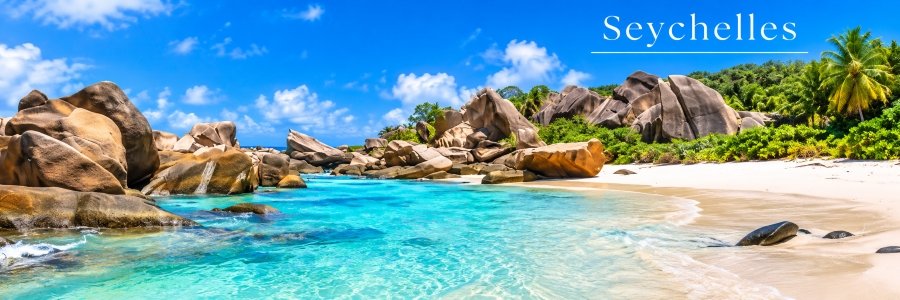 Seychelles coastline with giant granite boulders, turquoise water, and white sand, showcasing some of the most beautiful beaches in the world.