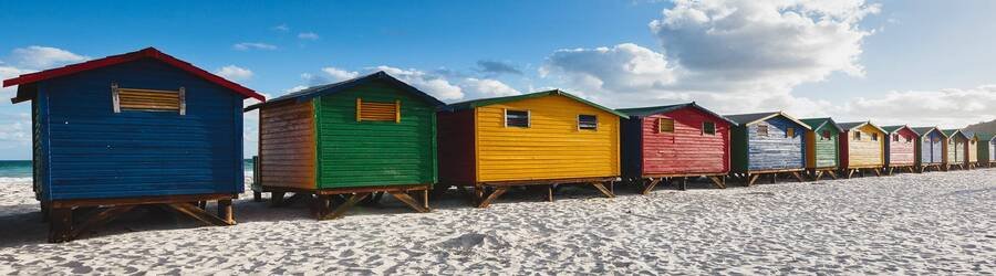 Colorful wooden beach huts on Muizenberg Beach Cape Peninsula South Africa.