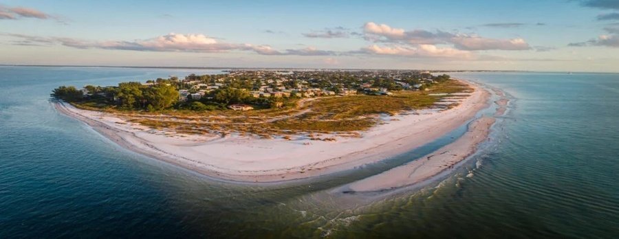 Aerial view of Bean Point on Anna Maria Island with white sand beaches and clear Gulf waters