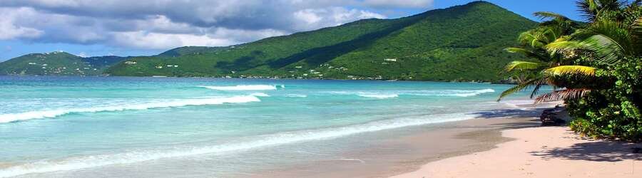 Tortola BVI beach with turquoise water and green hills