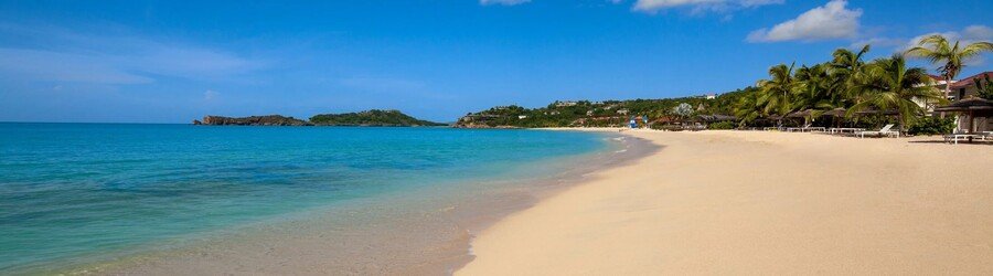 Galley Bay Beach Antigua with turquoise water and palm-lined sand
