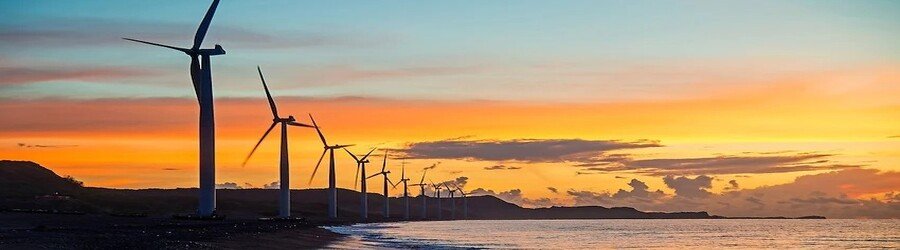 Bangui Windmills near Pagudpud Ilocos Norte at sunset along the coast
