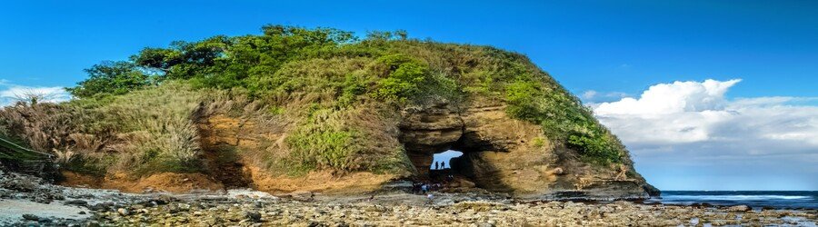 Bantay Abot Cave in Pagudpud Ilocos Norte with natural rock opening by the sea