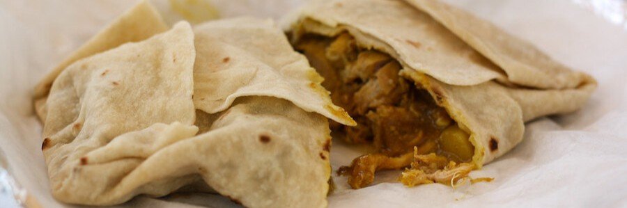 Caribbean chicken roti filled with warmly spiced curry