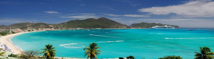 Great Bay Beach in St. Maarten with cruise ships in the distance