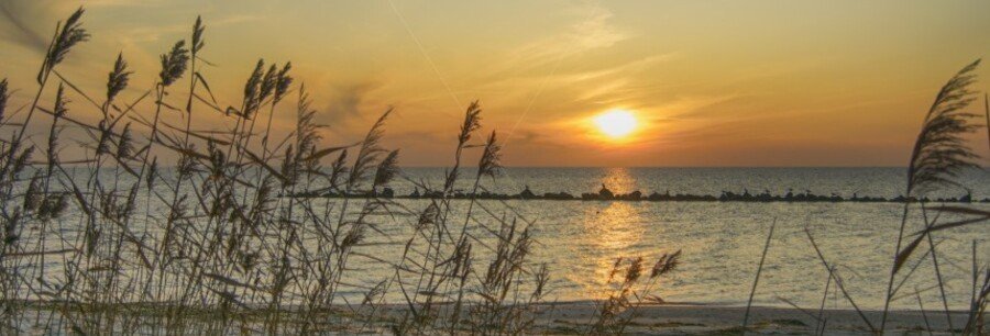 Sunset over Thiessow Beach on Rügen Island with Baltic Sea views and coastal dunes