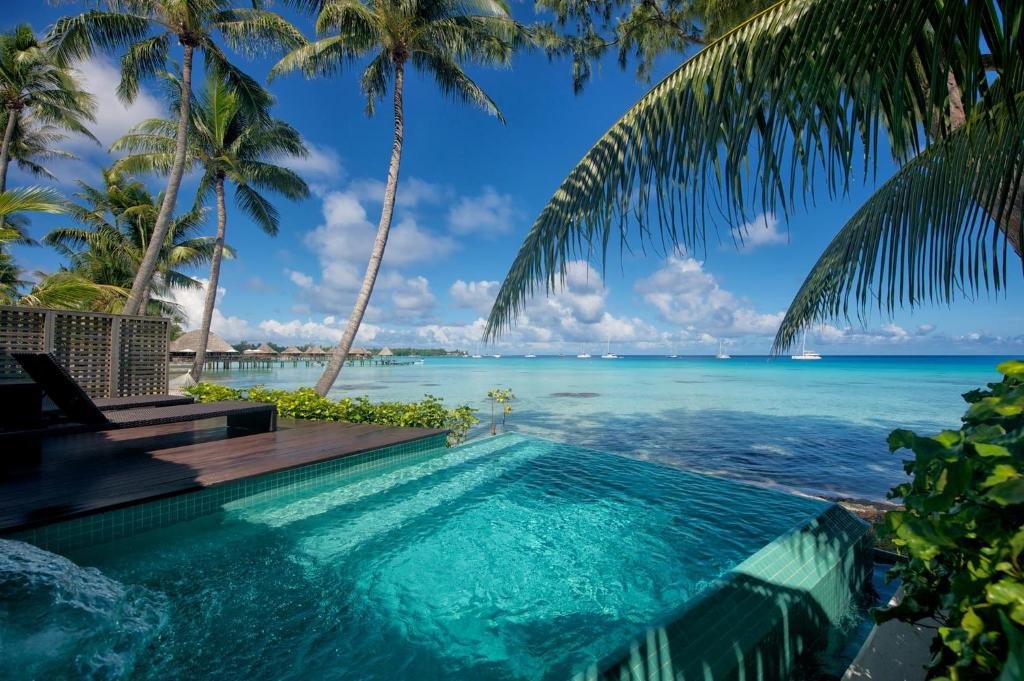 Infinity pool overlooking Rangiroa lagoon at Hotel Kia Ora Resort