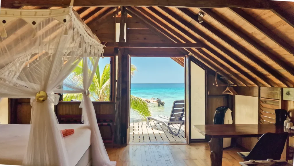 Bungalow opening directly to lagoon view at Tevahine Dream Rangiroa