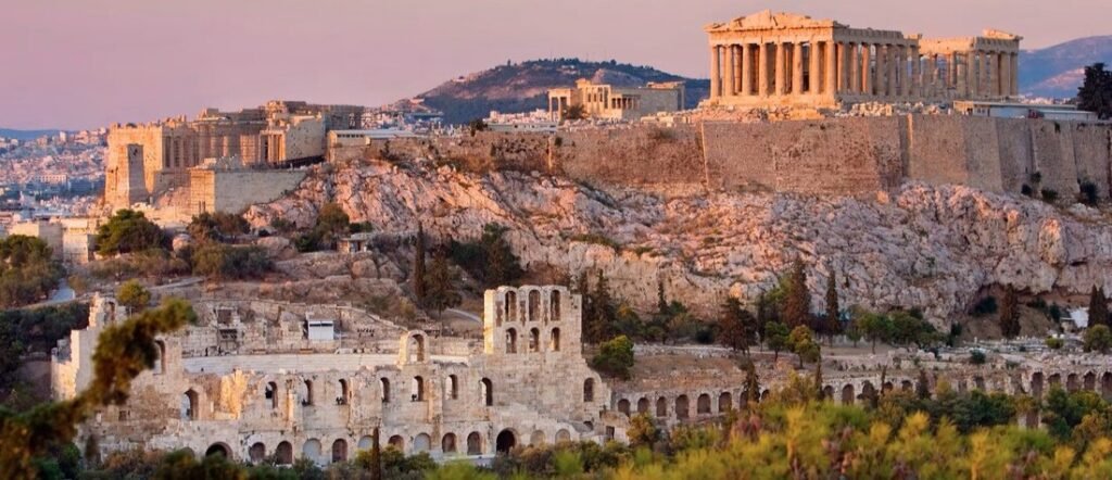 Acropolis and Parthenon in Athens overlooking city ruins and historic landscape. For a great Athens Cruise port.