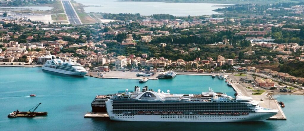 Barcelona cruise port aerial view with ships docked near the city and coastline