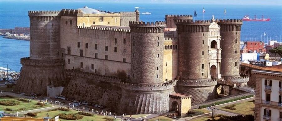 Castel Nuovo Maschio Angioino fortress overlooking the waterfront in Naples Italy