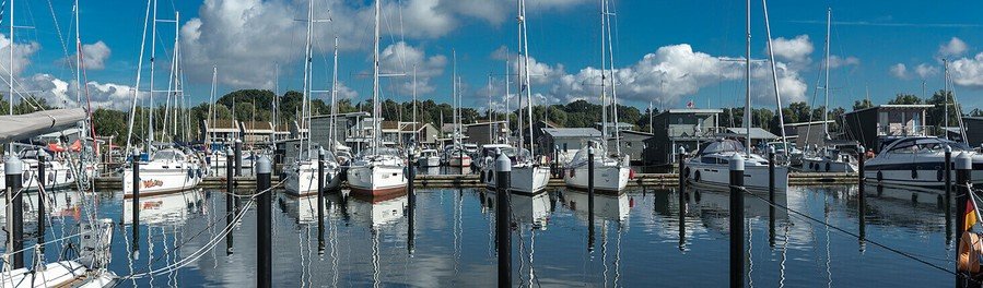 Boats and sailboats in the marina at Lauterbach harbor on Rügen Island Germany