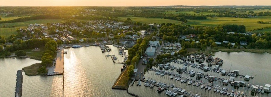 Aerial sunset view of Lauterbach harbor marina on Rügen Island Germany