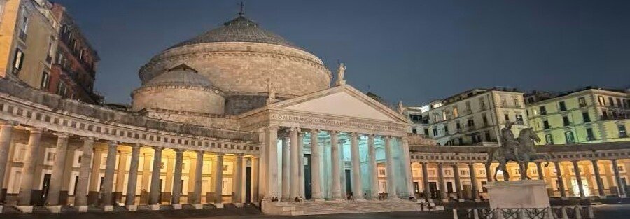 Piazza del Plebiscito with San Francesco di Paola basilica and colonnades in Naples Italy at sunset