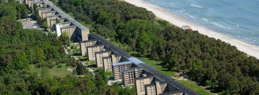 Aerial view of the massive Prora Colossus hotel complex along the Baltic Sea beach on Rügen Island Germany.