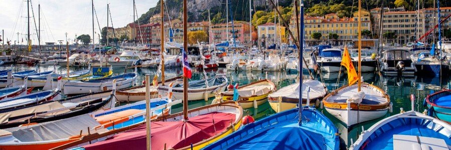 Nice Cruise Port waterfront with boats and yachts near Nice Port along the colorful French Riviera harbor