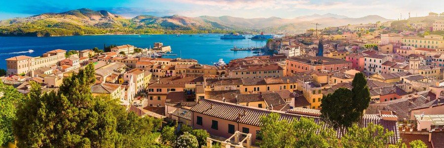 Livorno port and harbor view in Tuscany with colorful buildings and coastline