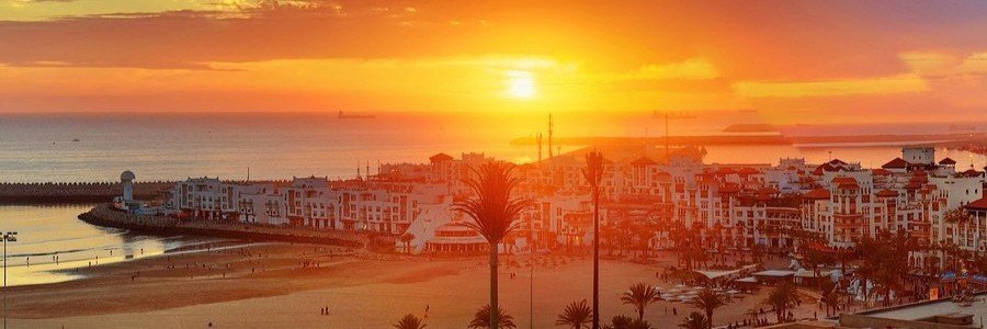 Sunset over Agadir coastline and marina in Morocco.