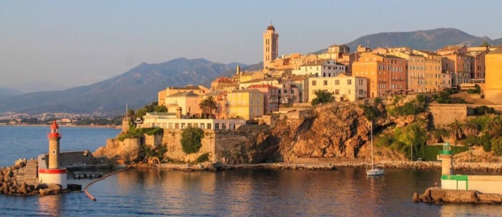 Bastia Old Town overlooking the harbor with lighthouse and coastline in Corsica