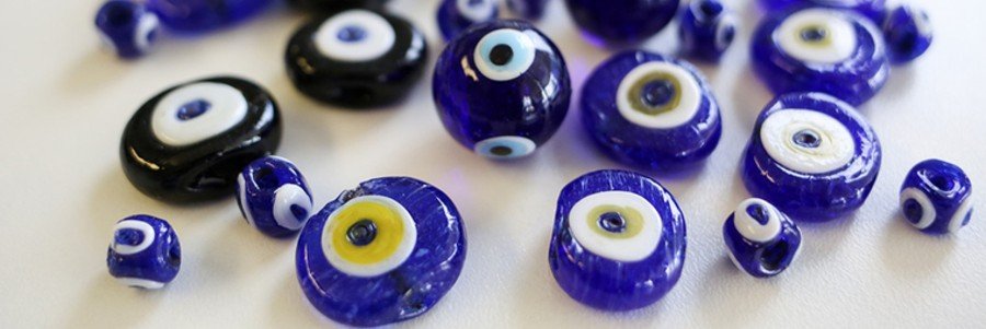 traditional Turkish evil eye souvenirs in blue glass displayed for sale