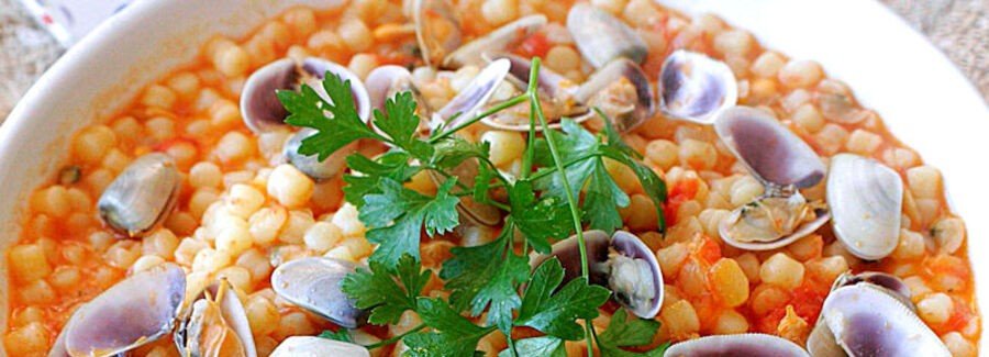 Fregula pasta with clams in Sardinia
