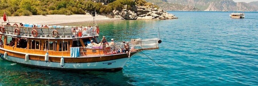 Boat tour near Kusadasi with swimming stop in clear turquoise water