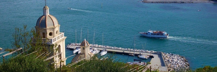 Harbor view in La Spezia with boats and coastal buildings
